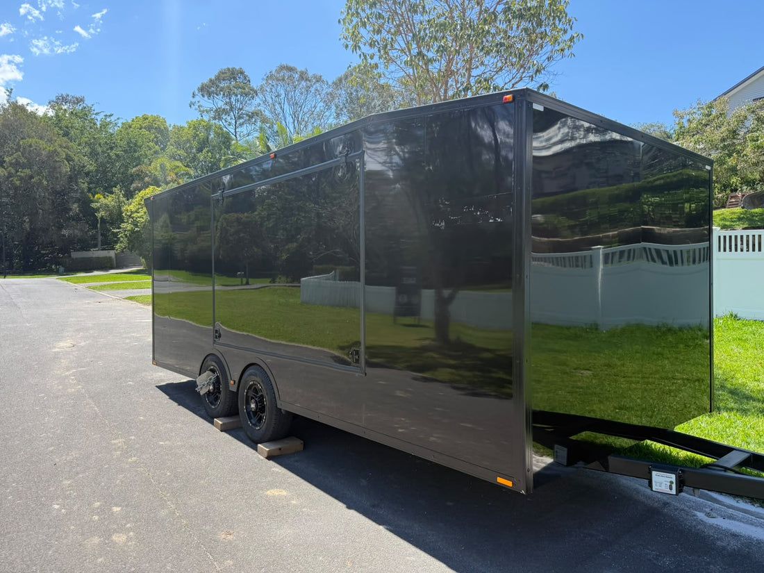 Enclosed trailer hire, front three quarter view with side access door