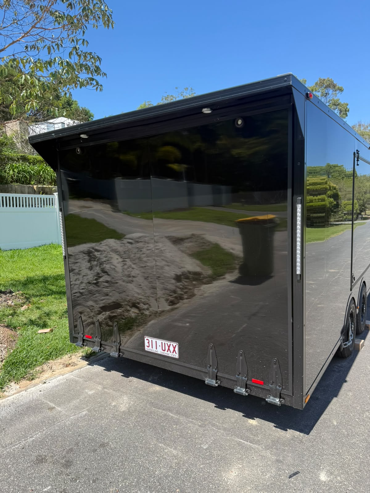 Enclosed trailer rear ramp door, gloss black finish